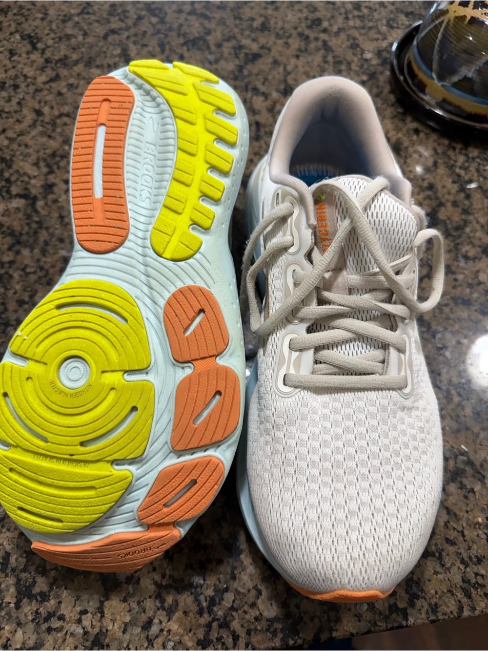 Brooks women’s Cream Running Shoes with Yellow & Orange Sole